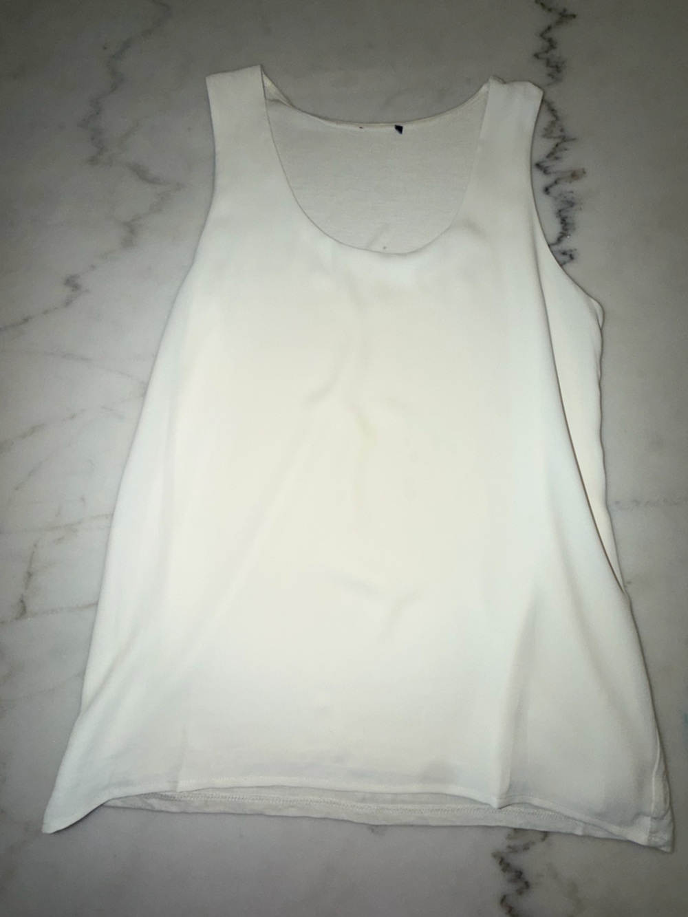 Minimalist White Sleeveless Top